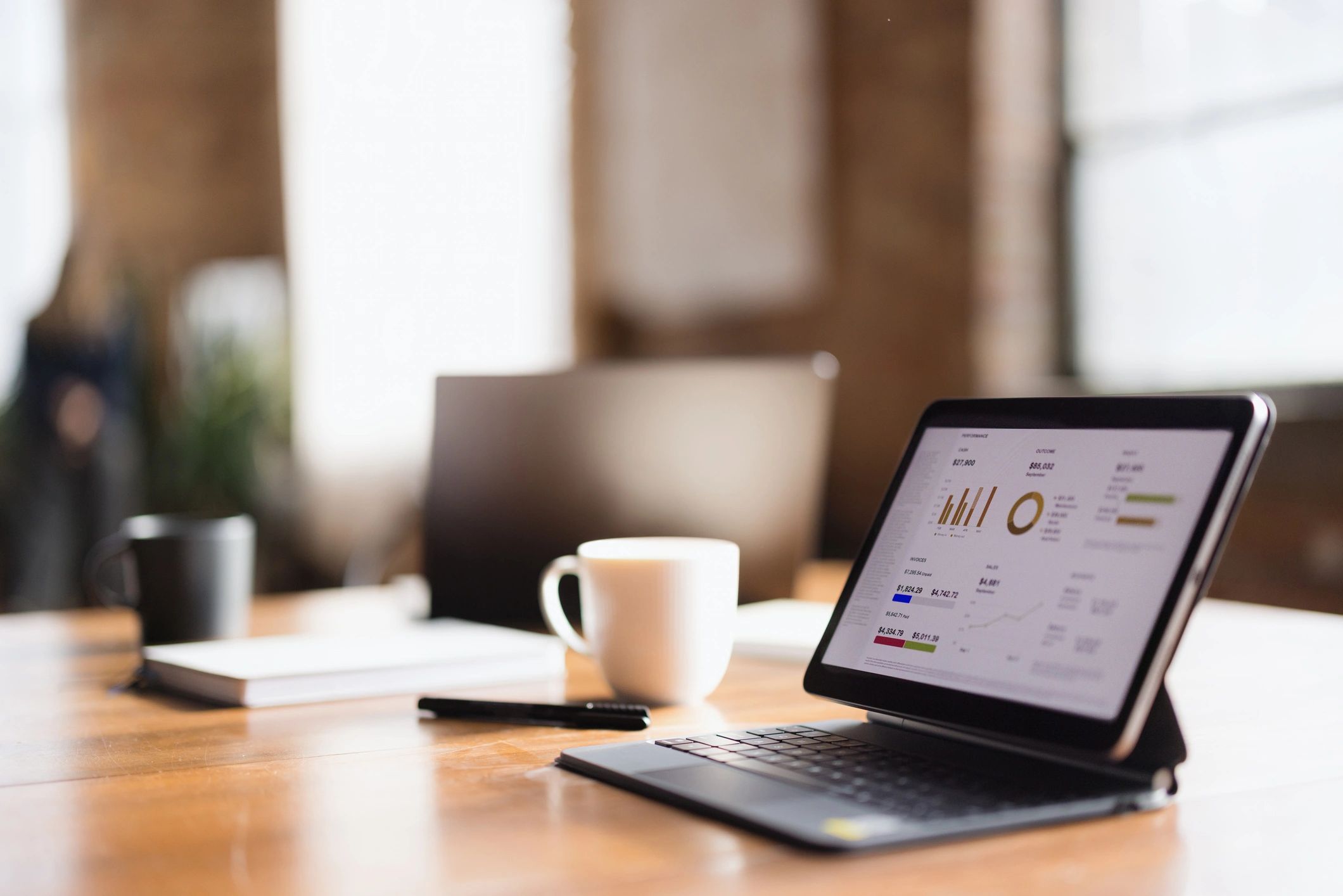 Tablet showing analytics charts and graphs