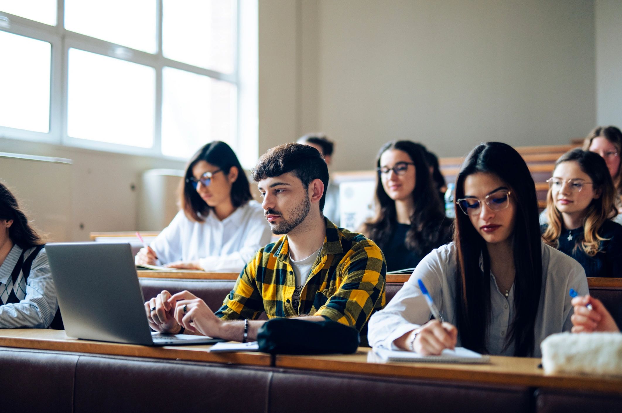 Students attending a lecture in a modern learning space