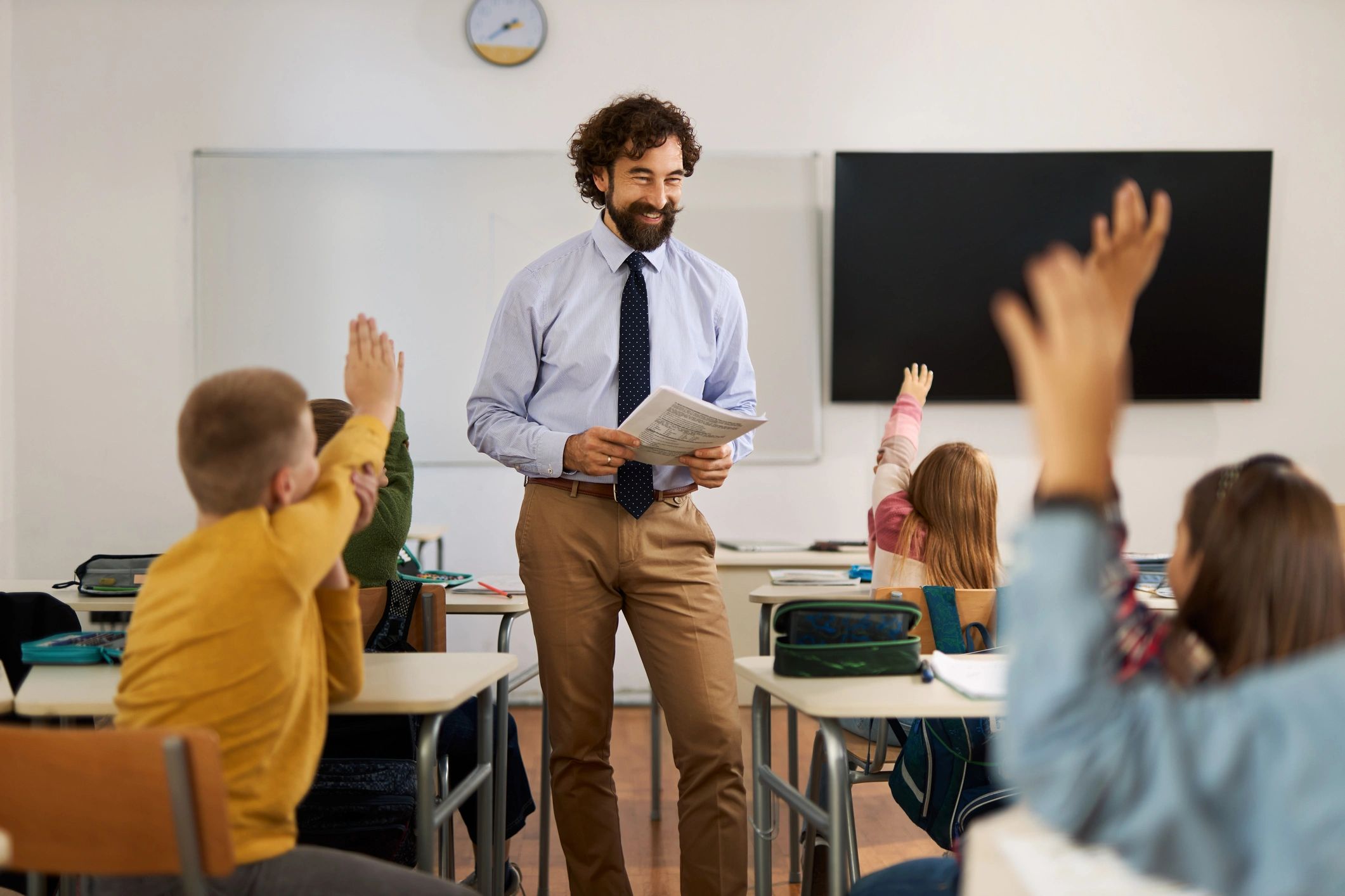 Teacher leading a classroom discussion